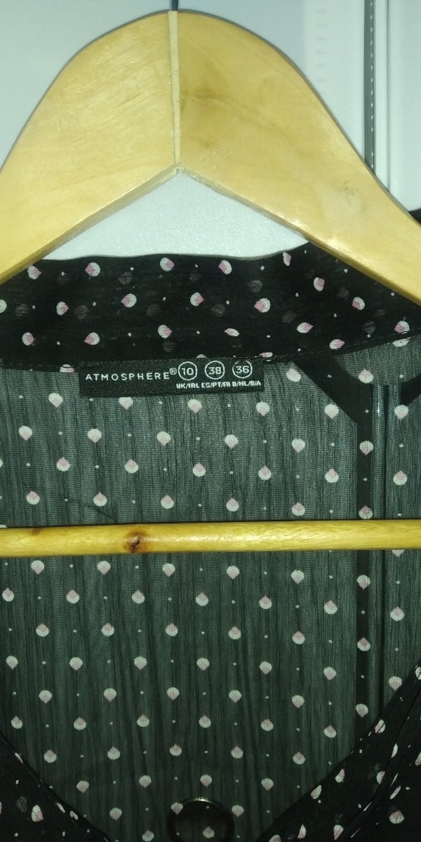 black shirt with dots