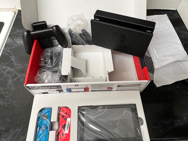 Brand New Nintendo Switch &amp; Mario Kart 8