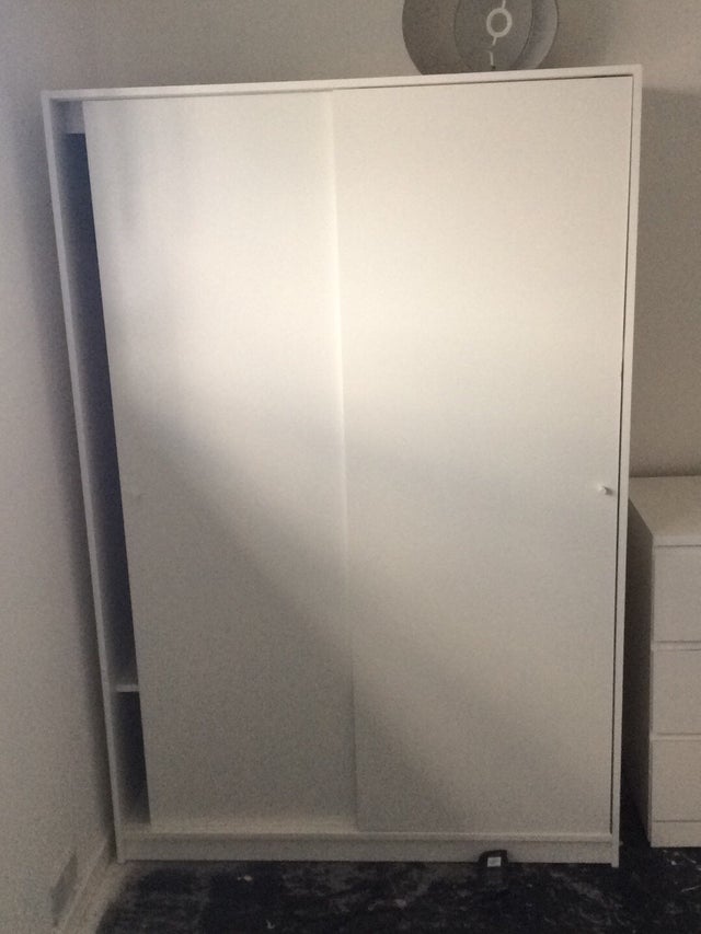 Wardrobe with sliding doors