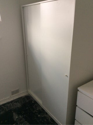 Wardrobe with sliding doors